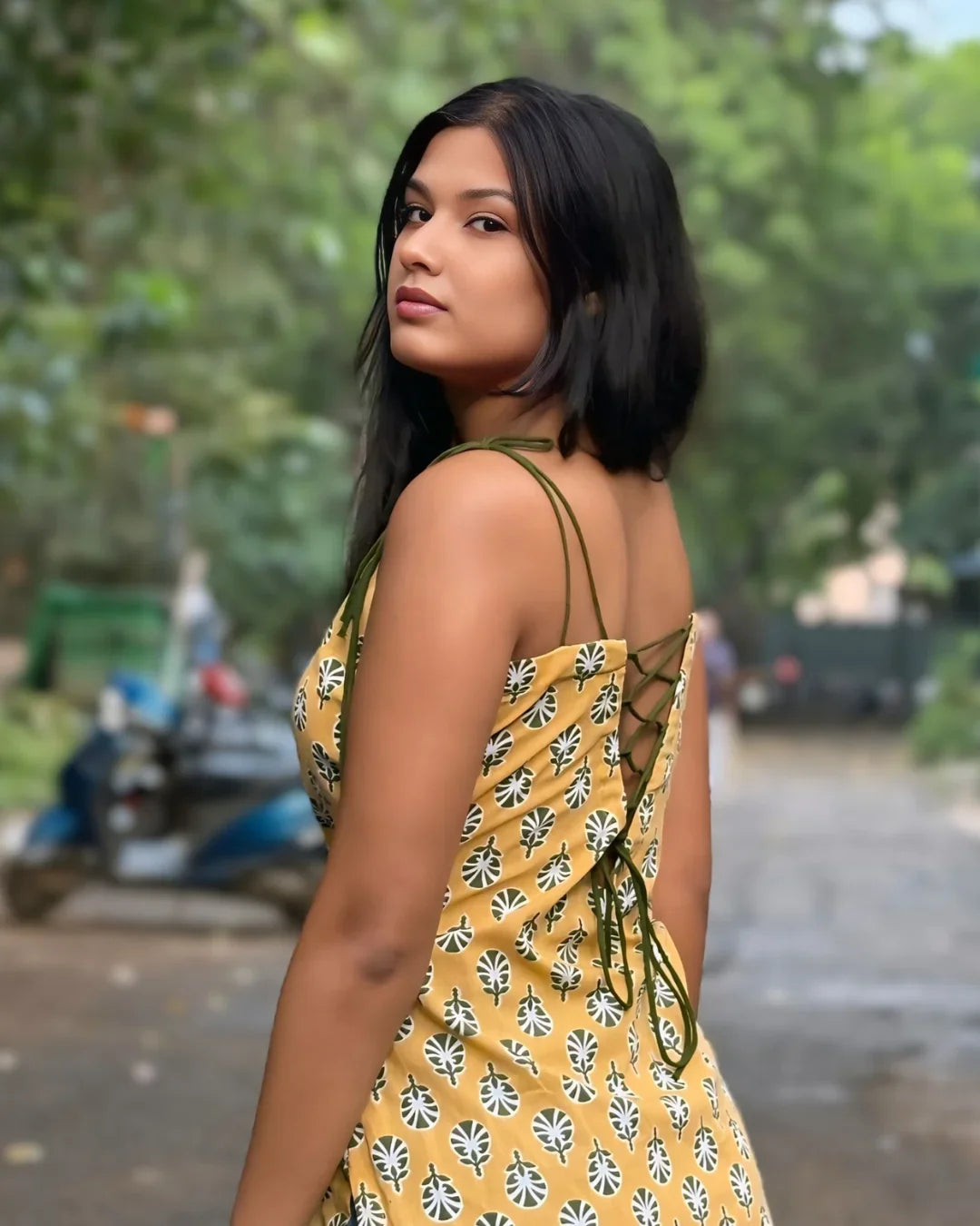 Yellow floral dress with lace-up back, elegant contemporary Indian fashion for women