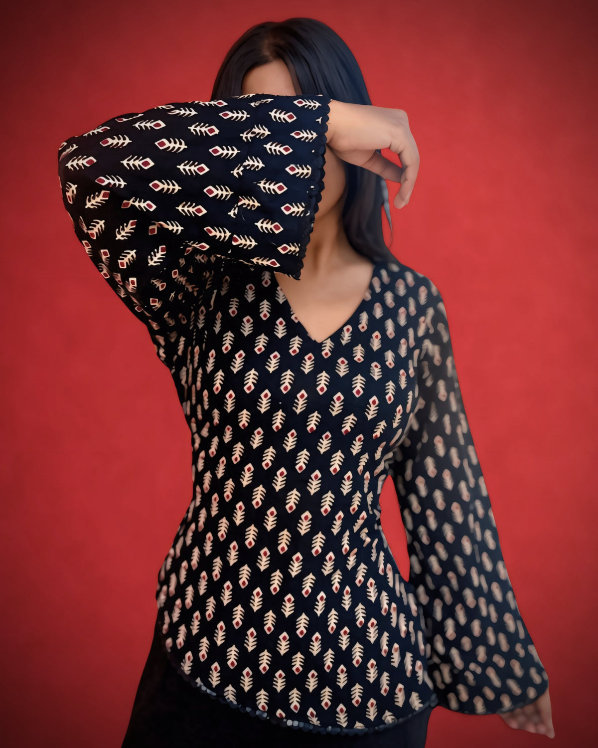 Nishika – Black Printed Cotton Flared Sleeve Kurti Top with Tie-Up Back