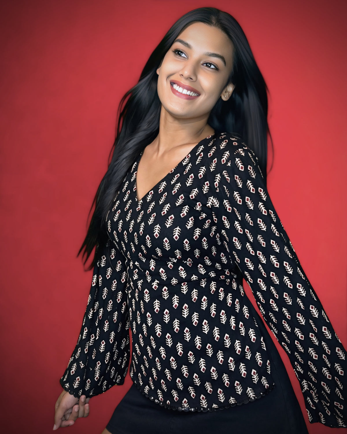 Nishika – Black Printed Cotton Flared Sleeve Kurti Top with Tie-Up Back